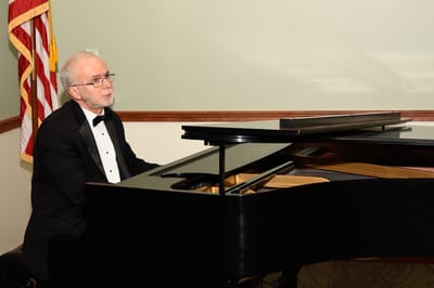Piano player at the December 2017 Friends Supporters evening